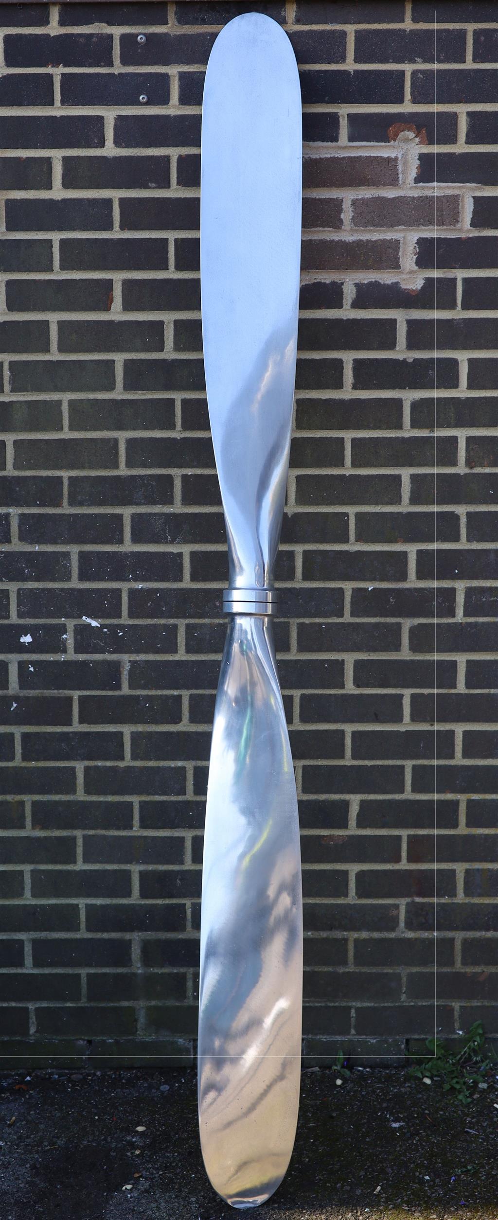 An aluminium propellor ornament, length 228cm